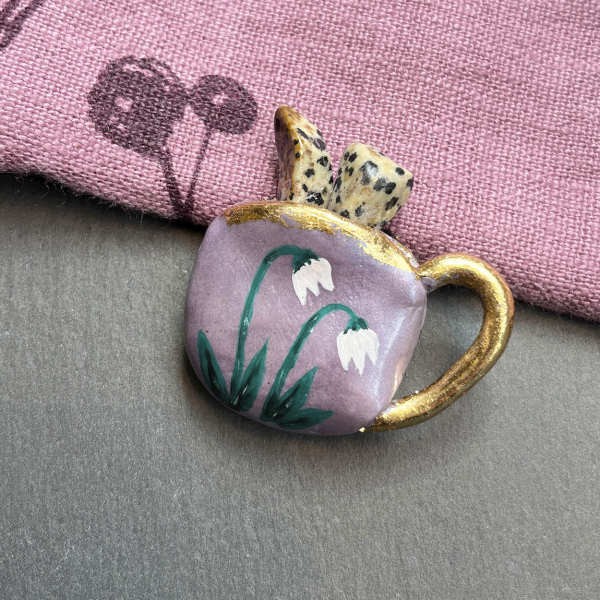 Brooch coffee cup